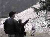 Larry points to where he landed in the rocks