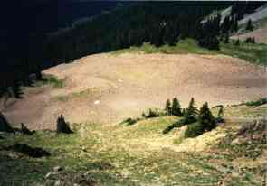 looking down from impact area to debris below